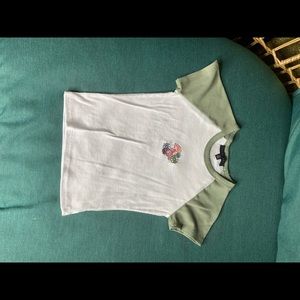 Green and white graphic tee